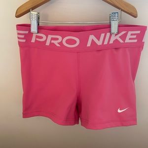 pink nike pros (size small)